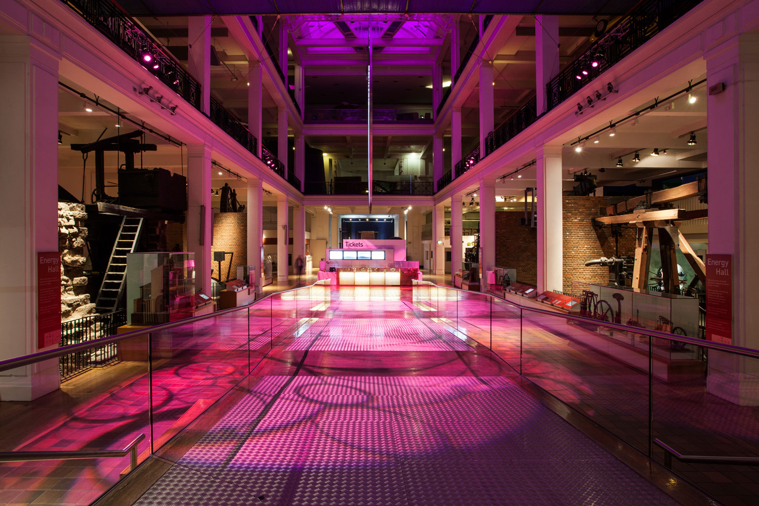 The Energy Hall, illuminated in pink light