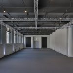 Empty event space with white walls